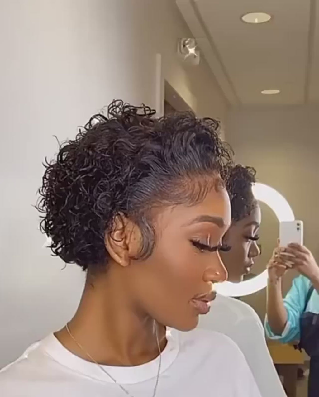 Promotional video for Pettyphia Pixie Cut Human Hair Wig, showcasing its natural look and lightweight design. The video features styling tips and testimonials from satisfied customers in cities like Atlanta, Los Angeles, and New York, highlighting the ease of online shopping.